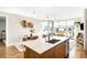 Bright living space with an open layout, modern island, and large windows offering city views at 4200 W 17Th Ave # 611, Denver, CO 80204