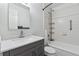 Bathroom features a new vanity, sink, toilet, mirror, and shower-tub combo at 3355 Talisman Ct # C, Boulder, CO 80301
