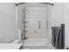 Bathroom features a new shower-tub combo, toilet, and grab bar at 3355 Talisman Ct # C, Boulder, CO 80301