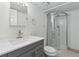 Updated bathroom features a new vanity, sink, lighting, and walk-in shower at 3355 Talisman Ct # C, Boulder, CO 80301