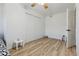 Bedroom features a spacious closet, vinyl wood flooring, and side table at 3355 Talisman Ct # C, Boulder, CO 80301