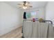Bright bedroom features a ceiling fan, window, and vinyl wood flooring at 3355 Talisman Ct # C, Boulder, CO 80301