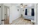 Bright bedroom features a ceiling fan, window, and vinyl wood flooring at 3355 Talisman Ct # C, Boulder, CO 80301