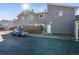Townhome exterior with gray siding, fenced yard and convenient access to parking and outdoor living at 3355 Talisman Ct # C, Boulder, CO 80301