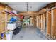 Attached garage is spacious and provides ample storage on wood shelving at 3355 Talisman Ct # C, Boulder, CO 80301