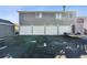 Townhome garages with white doors and gray siding, offering convenient parking and storage space at 3355 Talisman Ct # C, Boulder, CO 80301