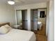 Bedroom with mirrored closet doors reflecting the interior at 1833 N Williams St # 507, Denver, CO 80218