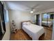 Bright bedroom with natural light, hardwood floors, and mirrored closet doors at 1833 N Williams St # 507, Denver, CO 80218