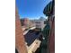 View of the neighborhood from the building showing parking and surrounding buildings at 1833 N Williams St # 507, Denver, CO 80218