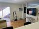 Living room with sliding glass doors to an outdoor patio at 1833 N Williams St # 507, Denver, CO 80218