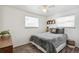 Cozy bedroom featuring a double bed and window at 6922 Vance St, Arvada, CO 80003