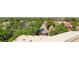 Aerial view showcases the property's lush surroundings at 410 Acoma St # 515, Denver, CO 80204