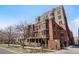 Beautiful brick building with unique facade and landscaping at 410 Acoma St # 515, Denver, CO 80204