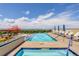 Rooftop pool with lounge chairs and mountain views at 410 Acoma St # 515, Denver, CO 80204