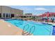 Rooftop pool with seating, beautiful blue water, and city views at 410 Acoma St # 515, Denver, CO 80204