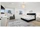 This spacious main bedroom features many windows for great natural light, and ample floor space at 6725 Beech Ct, Arvada, CO 80004