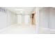 The basement boasts a neutral color scheme, access to the upper floors and ample storage closets at 11131 W Oregon Pl, Lakewood, CO 80232