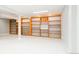 Finished basement showcasing a large built-in shelving unit, offering ample storage and display space at 11131 W Oregon Pl, Lakewood, CO 80232
