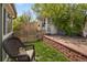 Inviting backyard featuring a private white gazebo and a cozy seating area on a stone patio at 11031 Marshall St, Westminster, CO 80020