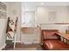 Bright entryway featuring hardwood-style floors, unique décor, and natural light at 11031 Marshall St, Westminster, CO 80020