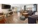 Spacious living room with hardwood flooring, stylish decor, and plenty of natural light at 11031 Marshall St, Westminster, CO 80020