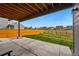 This backyard is fenced with a well-manicured lawn, and a patio, perfect for outdoor activities at 11744 Magnolia Dr, Thornton, CO 80233