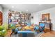 Cozy seating area filled with colorful decorations and plenty of room to relax at 11744 Magnolia Dr, Thornton, CO 80233