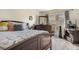 Cozy bedroom with a full bed, dresser, and window allowing lots of natural light at 15865 E Kepner Dr, Aurora, CO 80017