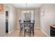 Dining area with a modern table, seating for six, and natural light is ideal for Gathering meals and gatherings at 15865 E Kepner Dr, Aurora, CO 80017