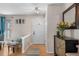 Inviting entryway features a neutral palette, hardwood floors, and decor that offers a warm and stylish welcome at 15865 E Kepner Dr, Aurora, CO 80017