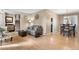 Open concept living area connects seamlessly, enhancing the flow between the living, dining, and kitchen spaces at 15865 E Kepner Dr, Aurora, CO 80017