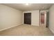 Basement with carpet, closet, and a view into unfinished space at 11129 Paradise Ln, Firestone, CO 80504