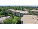 A birds eye view of the apartment buildings, showing balconies and mature landscaping at 13626 E Bates Ave # 302, Aurora, CO 80014