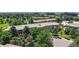 A tranquil residential neighborhood with mature trees, a peaceful pond, and manicured lawns at 13626 E Bates Ave # 302, Aurora, CO 80014