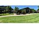 Beautiful building exterior with lush landscaping at 13626 E Bates Ave # 302, Aurora, CO 80014
