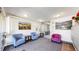 Inviting lobby with comfortable seating and views into the mail room at 13626 E Bates Ave # 302, Aurora, CO 80014