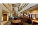 Spacious lobby area with fireplace and comfortable seating at 13626 E Bates Ave # 302, Aurora, CO 80014