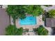 An inviting swimming pool is surrounded by ample lounge chairs and shaded seating areas at 13626 E Bates Ave # 302, Aurora, CO 80014