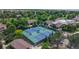 Well maintained tennis courts surrounded by trees and landscaping for an active lifestyle at 13626 E Bates Ave # 302, Aurora, CO 80014