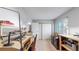 Bright work room featuring a sliding door closet and a large work area at 13626 E Bates Ave # 302, Aurora, CO 80014