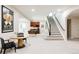 Finished basement featuring a pool table, wet bar, and staircase at 5301 S Birch Ct, Greenwood Village, CO 80121