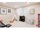 Inviting playroom featuring a toy tent, shelving, decorations and a keyboard at 5301 S Birch Ct, Greenwood Village, CO 80121