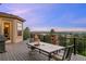 Relax on this back deck and enjoy views of the city and the lush, green landscape at 12147 S Shady Pine Ct, Parker, CO 80134