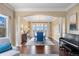 This home's dining room is framed by archways and features a bay window for natural light at 12147 S Shady Pine Ct, Parker, CO 80134
