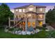 The house features a large deck and a stone patio, perfect for outdoor entertaining and relaxation at 12147 S Shady Pine Ct, Parker, CO 80134