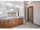 Double vanity bathroom with wood cabinets and shower at 118 S Eldridge Way, Golden, CO 80401