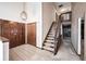 Inviting entryway with hardwood floors and staircase at 118 S Eldridge Way, Golden, CO 80401