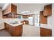 Kitchen with wood cabinets, tiled floors and ample counter space at 118 S Eldridge Way, Golden, CO 80401