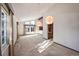 Bright and airy living room with views to the kitchen area at 118 S Eldridge Way, Golden, CO 80401