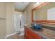 Stylish bathroom boasts granite counters, vessel sink, glass enclosed shower, and modern fixtures at 10125 Quarry Hill Pl, Parker, CO 80134